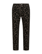 Loose stretch jeans with flocked DG print - | Dolce & Gabbana