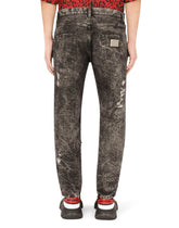 Loose gray wash jeans with rips - | Dolce & Gabbana