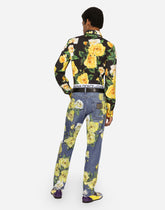 Loose blue denim jeans with all-over rose print - | Dolce & Gabbana