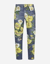 Loose blue denim jeans with all-over rose print - | Dolce & Gabbana