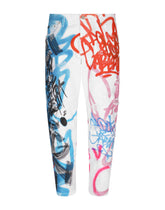 Loose jeans with spray-paint graffiti print - | Dolce & Gabbana
