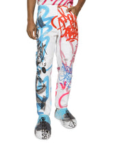Loose jeans with spray-paint graffiti print - | Dolce & Gabbana