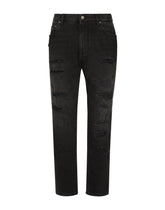 Loose black wash jeans with rips - | Dolce & Gabbana