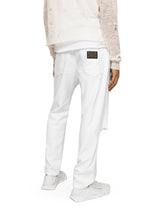 Loose white jeans with rips and abrasions - | Dolce & Gabbana