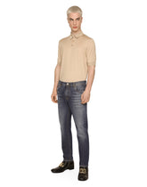 Loose fit washed stretch jeans with subtle abrasions - | Dolce & Gabbana