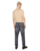 Loose fit washed stretch jeans with subtle abrasions - | Dolce & Gabbana