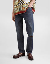 Cotton loose-fit jeans with tag - | Dolce & Gabbana