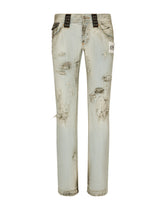 Washed dirty denim jeans with rips - | Dolce & Gabbana
