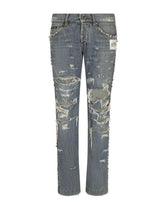 Washed denim jeans with studs and rips - | Dolce & Gabbana