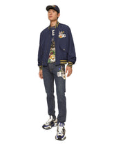 Slim-fit stretch denim jeans with DG patch - | Dolce & Gabbana