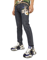 Slim-fit stretch denim jeans with DG patch - | Dolce & Gabbana