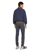 Slim-fit stretch denim jeans with DG patch - | Dolce & Gabbana