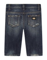 Jeans with multi-colored studs - | Dolce & Gabbana