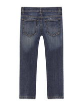 Slim-fit blue wash jeans with heraldic patch - | Dolce & Gabbana