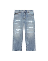 Washed denim jeans with abrasions - | Dolce & Gabbana