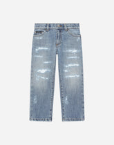 Washed denim jeans with abrasions - | Dolce & Gabbana