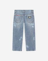 Washed denim jeans with abrasions - | Dolce & Gabbana