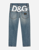 5-pocket treated stretch denim jeans with logo print - | Dolce & Gabbana