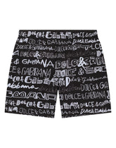 Nylon swim trunks with all-over logo print - | Dolce & Gabbana