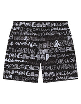 Nylon swim trunks with all-over logo print - | Dolce & Gabbana
