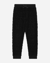 Terrycloth jogging pants with jacquard logo - | Dolce & Gabbana