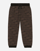 Cotton jogging pants with the all-over logo print - | Dolce & Gabbana