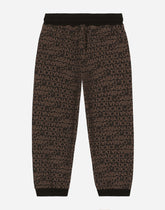 Cotton jogging pants with the all-over logo print - | Dolce & Gabbana