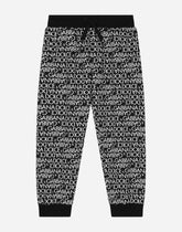 Cotton jogging pants with the all-over logo print - | Dolce & Gabbana