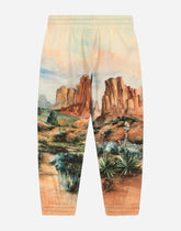 Cotton jogging pants with canyon print and logo tag - | Dolce & Gabbana