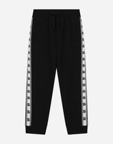 Cotton jogging pants with logo band on side - | Dolce & Gabbana