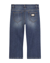Stretch denim jeans with branded tag - | Dolce & Gabbana