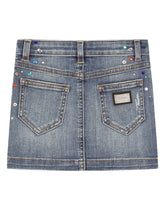 Short denim skirt with multi-colored fusible rhinestones - | Dolce & Gabbana