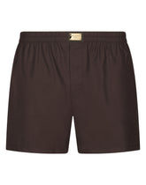 Cotton poplin shorts with brand plate - | Dolce & Gabbana
