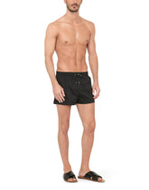Short swim trunks in hydro-sensitive fabric with logo print - | Dolce & Gabbana