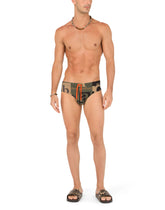 Swim briefs with all-over logo print - | Dolce & Gabbana