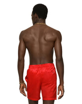 Mid-length swim trunks with DG Monogram print - | Dolce & Gabbana