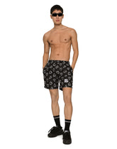 Mid-length swim trunks with DG heart print - | Dolce & Gabbana