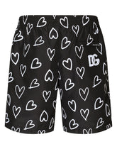 Mid-length swim trunks with DG heart print - | Dolce & Gabbana