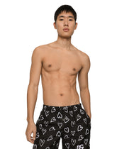 Mid-length swim trunks with DG heart print - | Dolce & Gabbana