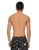 Mid-length swim trunks with DG heart print - | Dolce & Gabbana