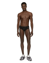 Swim briefs with high-cut leg and branded plate - | Dolce & Gabbana