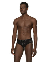 Swim briefs with high-cut leg and branded plate - | Dolce & Gabbana
