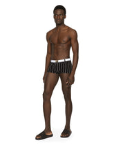 Striped-print high-legged swim trunks with DG logo belt - | Dolce & Gabbana