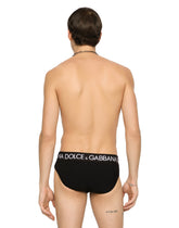 Swim briefs with high-cut leg and branded rear waistband - | Dolce & Gabbana