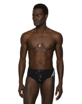 Swim briefs with high-cut leg and branded band - | Dolce & Gabbana
