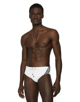 Swim briefs with high-cut leg and branded band - | Dolce & Gabbana