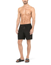 Mid-length swim trunks with branded plate - | Dolce & Gabbana