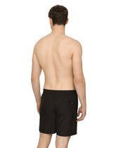 Mid-length swim trunks with branded plate - | Dolce & Gabbana