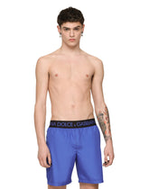 Mid-length swim trunks with branded stretch waistband - | Dolce & Gabbana