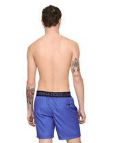 Mid-length swim trunks with branded stretch waistband - | Dolce & Gabbana